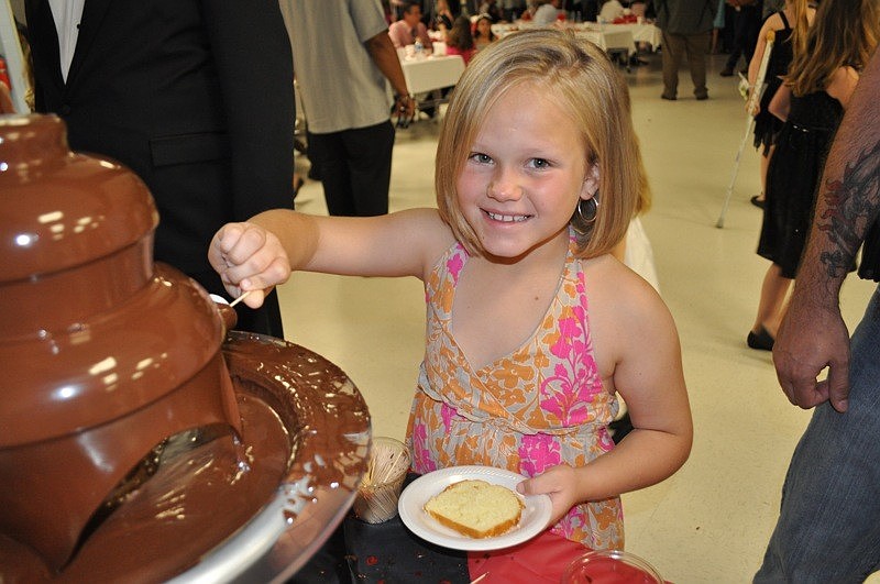 Emma McIntyre, 9, was sure to visit the fondue station.