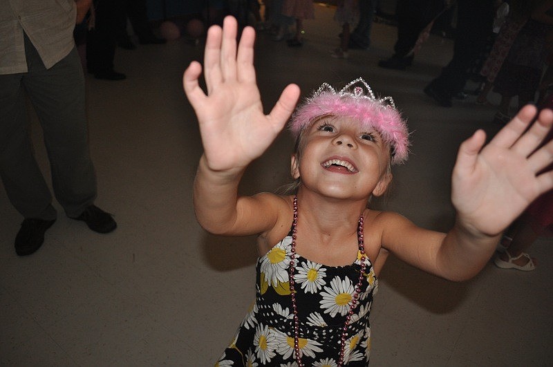 Five-year-old Danielle Kirchberg had fun chasing a balloon.