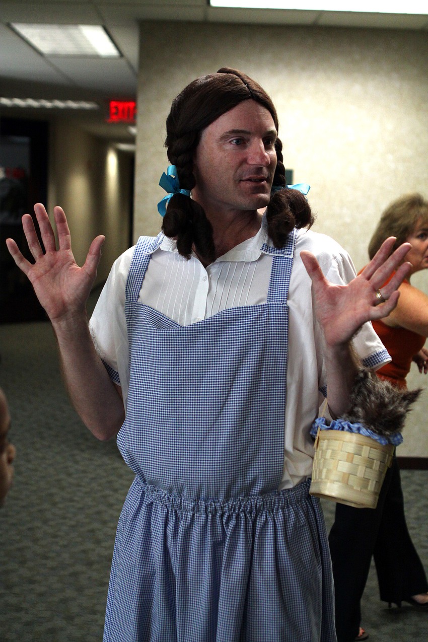 Jay Henderson, dressed as Dorothy, tells the girls to be prepared to see the Wizard of Oz, one of the many themes of the haunted halls of UBS.