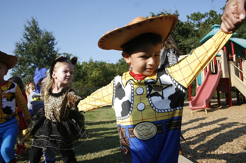 Justin Garcia was one of several Woody characters in this year's parade.