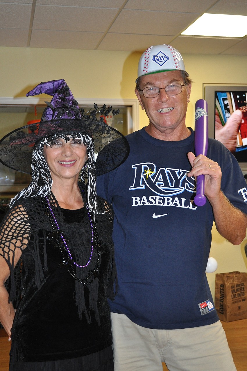 Phyllis and Jim McGuire as a witch and a Rays fan.