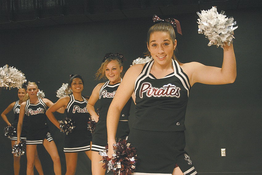 Taylor Nardone, right, and the cheerleaders performed several times throughout the pep rally.