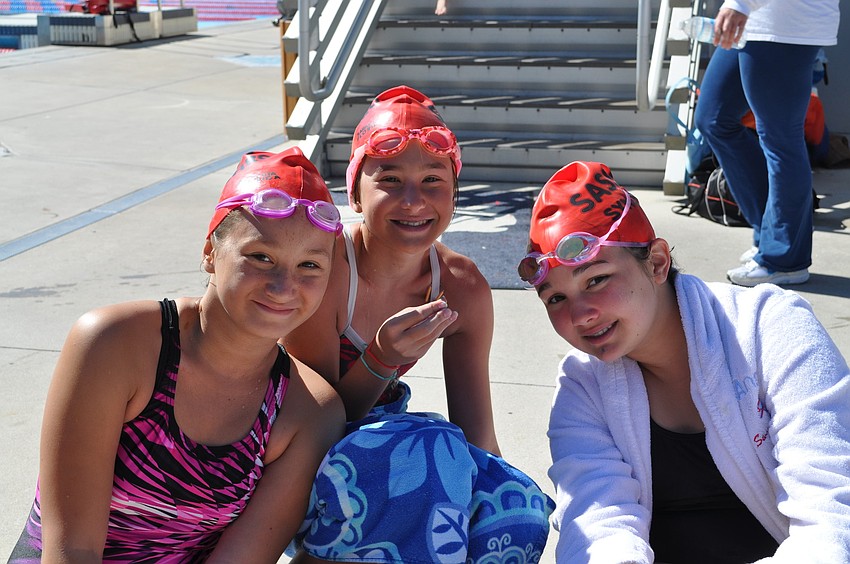 Natasha Nielsen, Gracie Brasacchio and Anne Marie Eible take a snack break.