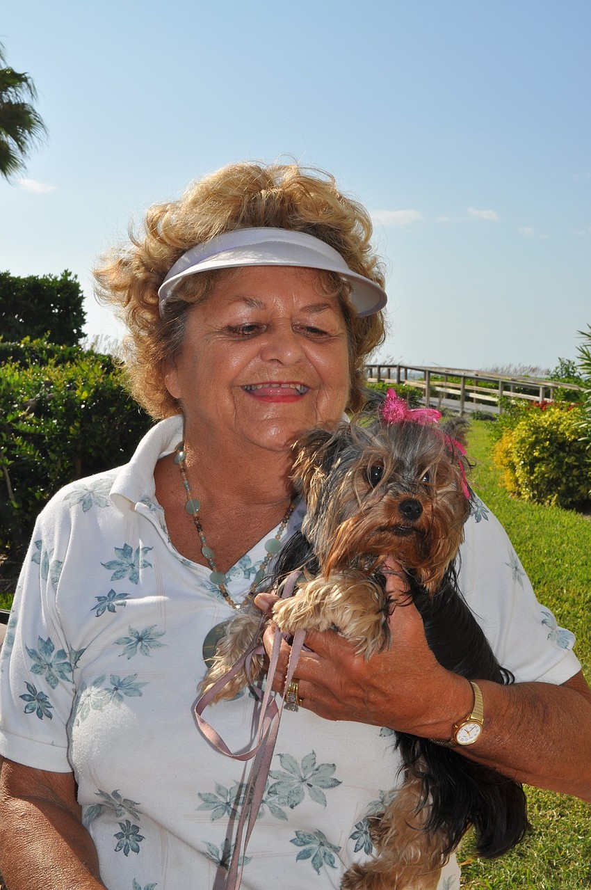 Penny Swoboda brought her Yorkshire terrier, Cleo, to the party.