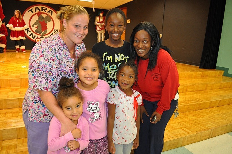 Pictured clockwise from bottom left: Jayda Repetti, Marissa Repetti, Lazaria Stubbs, Carla Dunbar, Lodericka Frazier and Julisa Repetti.