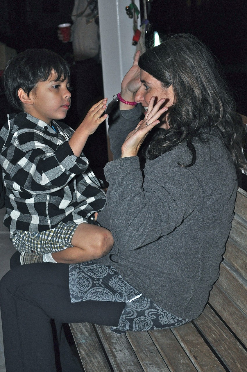 Benjamin and Marla Katz play a game.