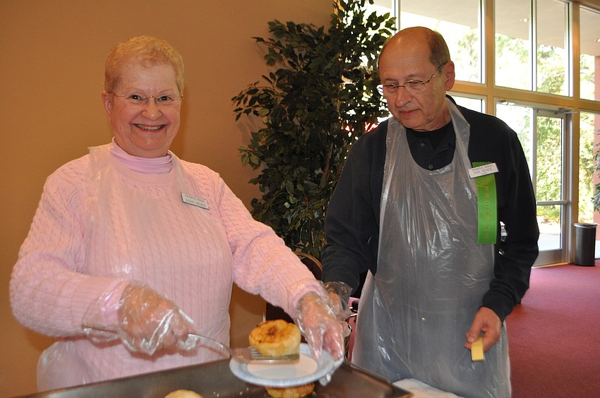 Doris and Ron Benice serve homemade knish.