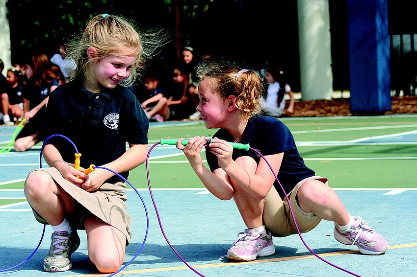 Chelsea Ball and Reece Whatmore talk during ODA's Jump Rope for Heart in event February.
