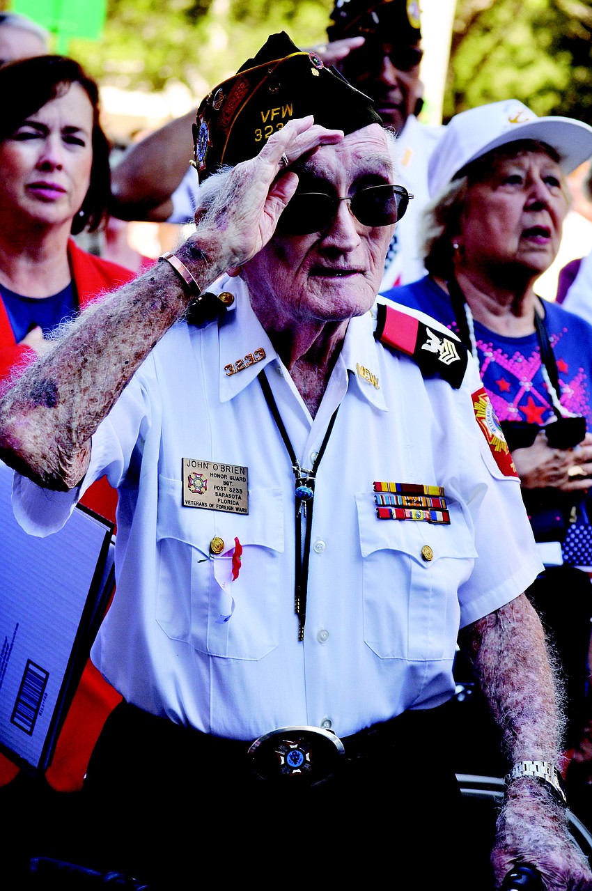 John O'Brien saluted during the national anthem at the annual Veterans Day ceremony and flagpole dedication in November.