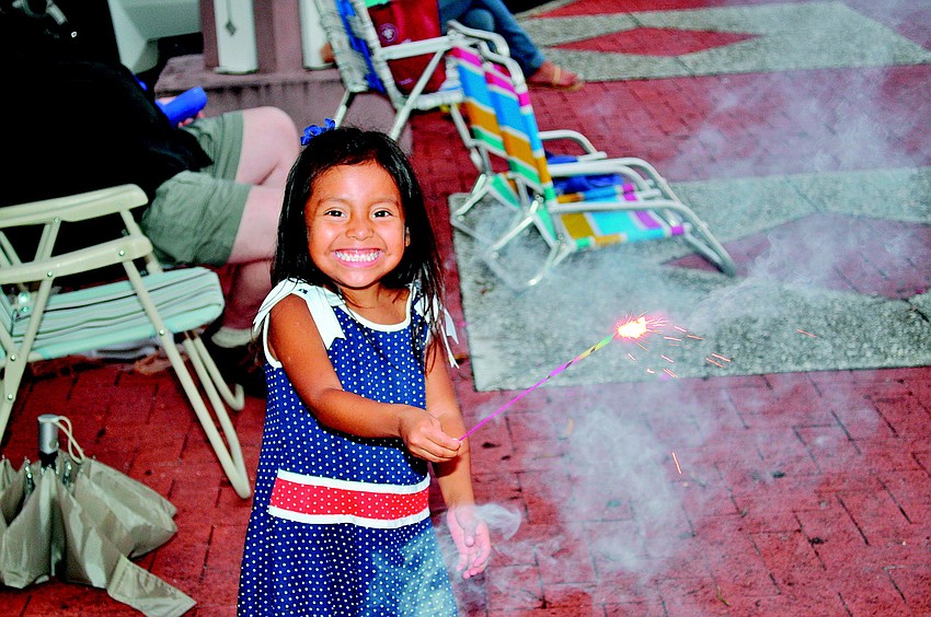 Audrey Sugamura has fun on the Fourth of July at the Sarasota bayfront.