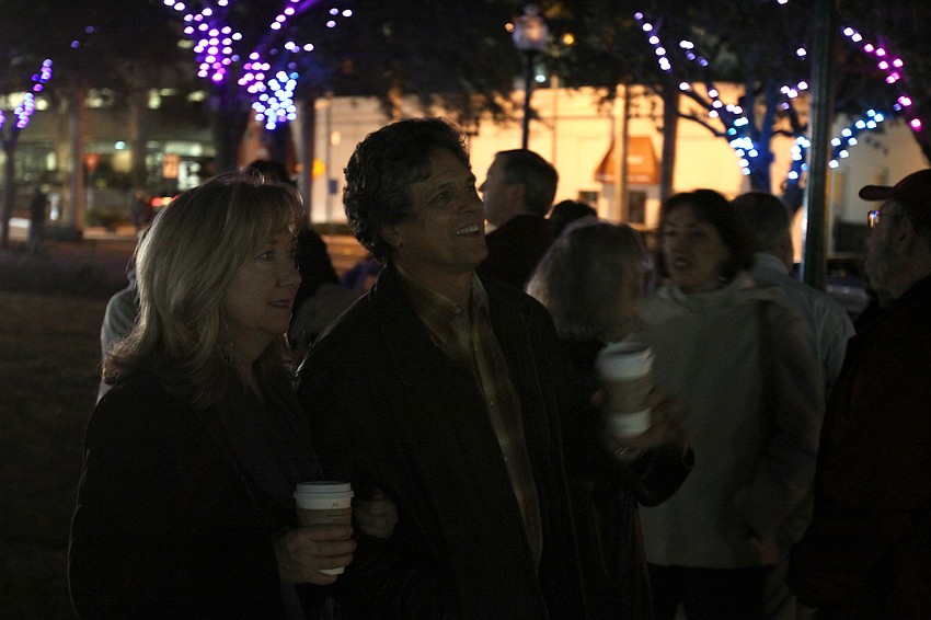 Donna and Paul Rutledge take in the light display at Five Points Selby Park Friday evening.