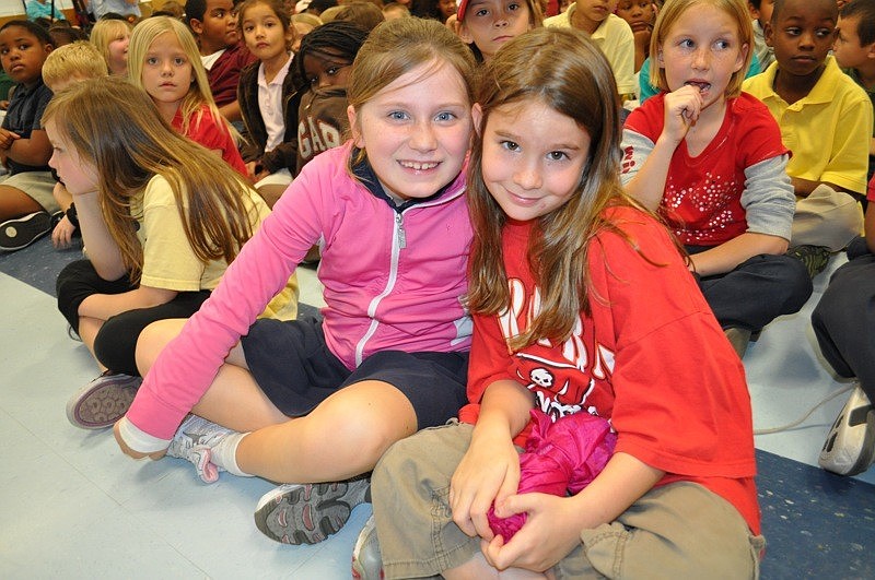 Aly Wilson and Ana Beasley, both 7, got front row seats.