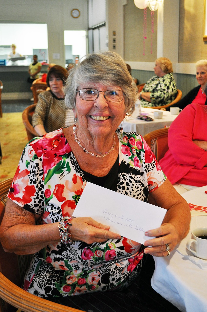 Sue Troup won a manicure in the raffle for the second year in a row.