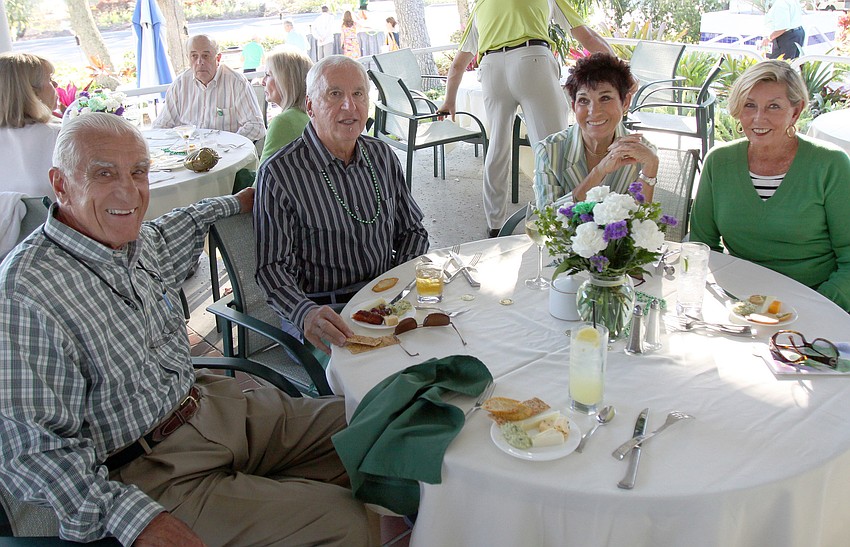 Joe Giuliani, Lou Clemente, Ann Clemente and Anne Giuliani enjoy themselves on Thursday, March 17 at Longboat Key Club's outdoor Harbourside dining patio.