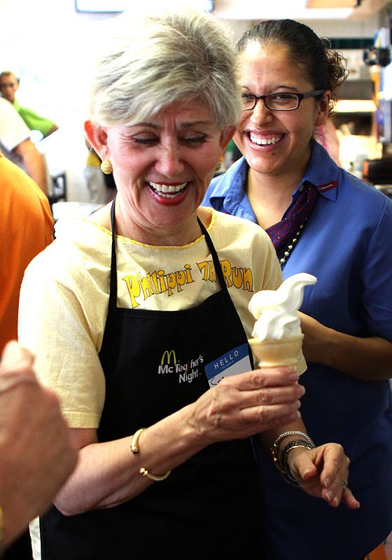 Itzel Lieberman, Spanish teacher, laughs over her attempt at soft serve.