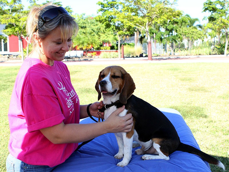 Katie Jones and Charlie at Abundant Life Massge's tent.