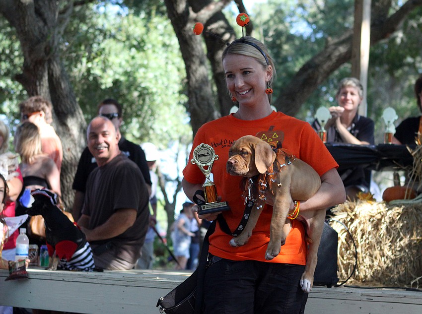 Max, 13-weeks, won for Most Embarrassed Dog after having an accident in front of the judges.