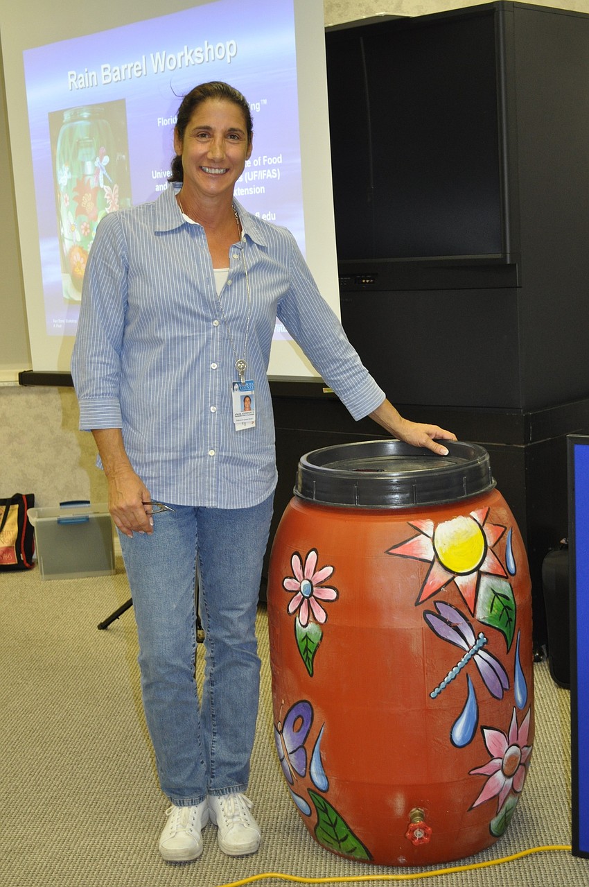 Florida Yard & Neighborhoods Coordinator Angie Antonucci brought a rain barrel for her presentation on the benefits of rain barrels