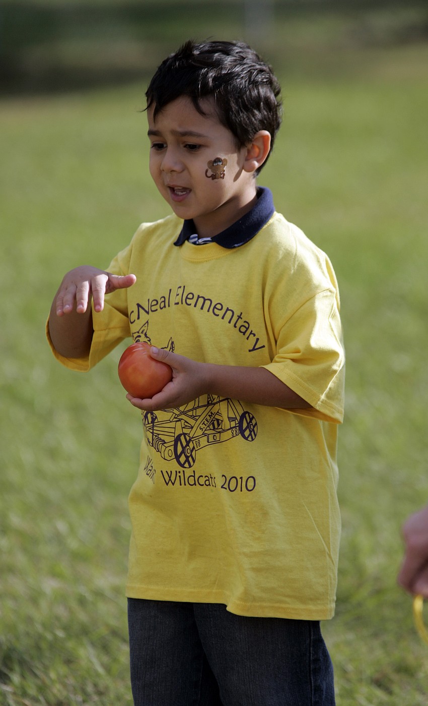 Kingergartener Thomas Lopez showed off his dance moves while waiting for his turn at the catapult.