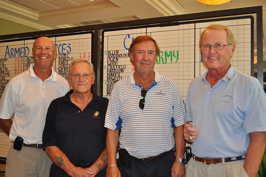 Team captains: Jerry Shuster, Army; Arnie Koch, Marines; Scott Kennedy, Navy and Mike Charles; Air Force.