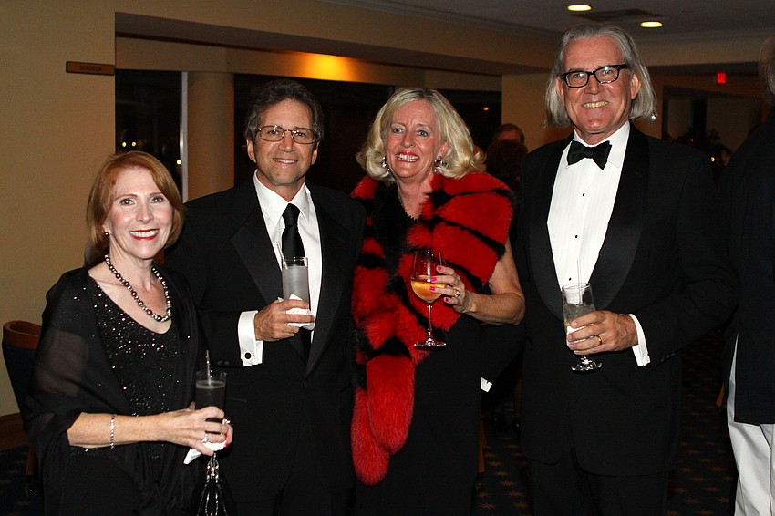 Carol and Barry Zitnick with Annette and Bill Lloyd at the Commodore's Ball.