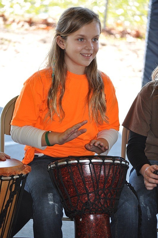 Michelle Sobelewski, co-captain of the Safety Patrol, led her classmates in a drum rhythm.