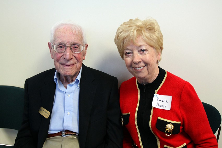 Bob Rosenthal and Estelle Hayes sit next to one another during AJCâ€™s Grand Opening Cocktail Party on Thursday.