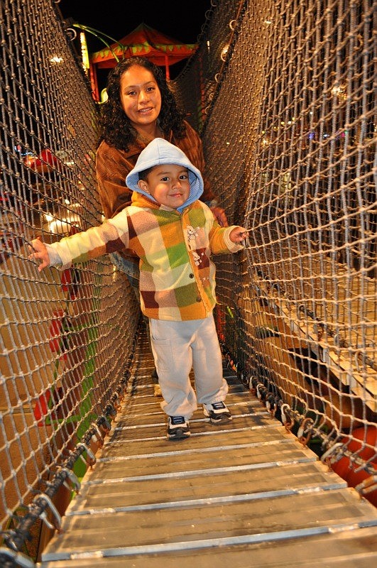 Ricardo Gayosso, 3, enjoyed the midway with his mother, Lorena Hernandez.