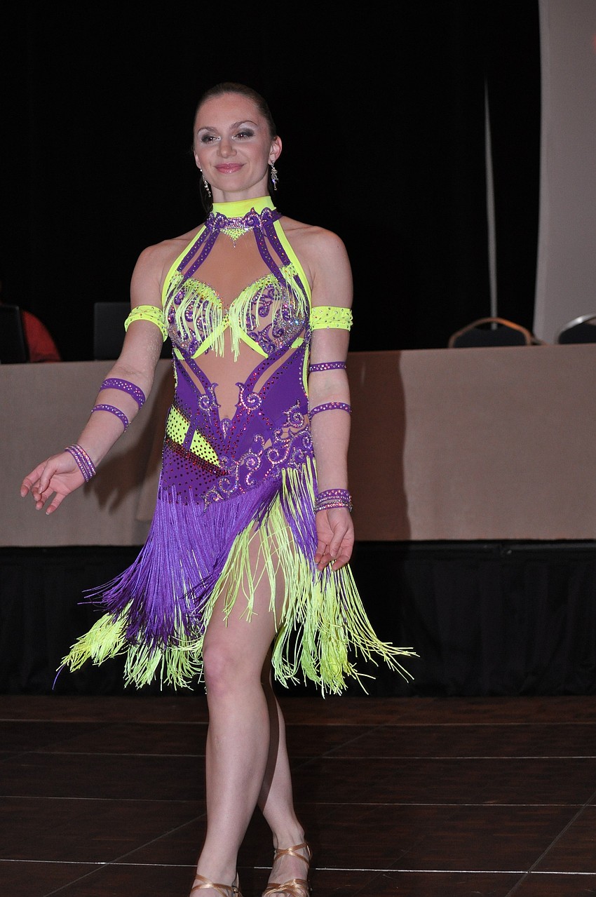 Alissia Bishop models a Latin dance dress.