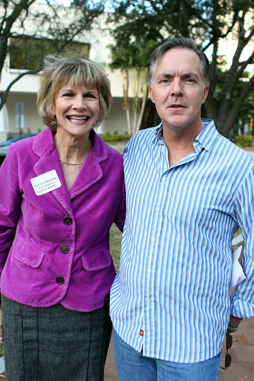 Commission liaison Suzanne Atwell and Robert Warren enjoy catching up during the Intersections Kickoff Celebration on Thursday, Jan. 20.
