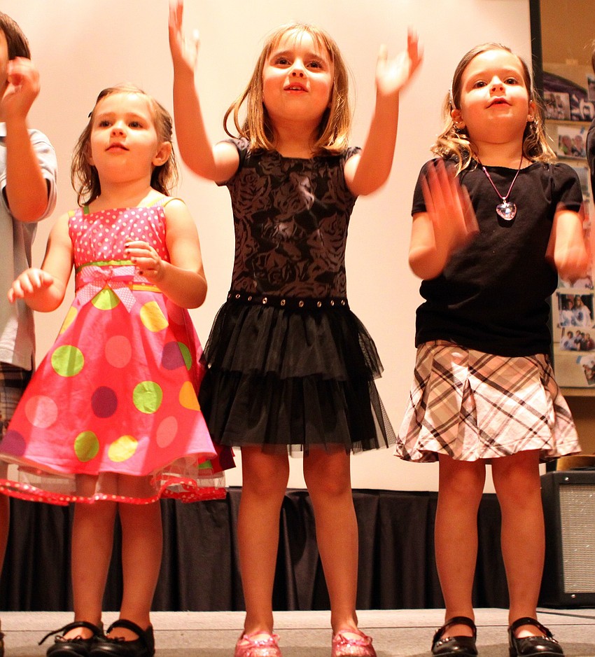 Lizzy Lawson, Lucy Thomas, and Amelia Hilton singing Rum Sum Sum on Lizzy Lawson, Lucy Thomas, and Amelia Hilton