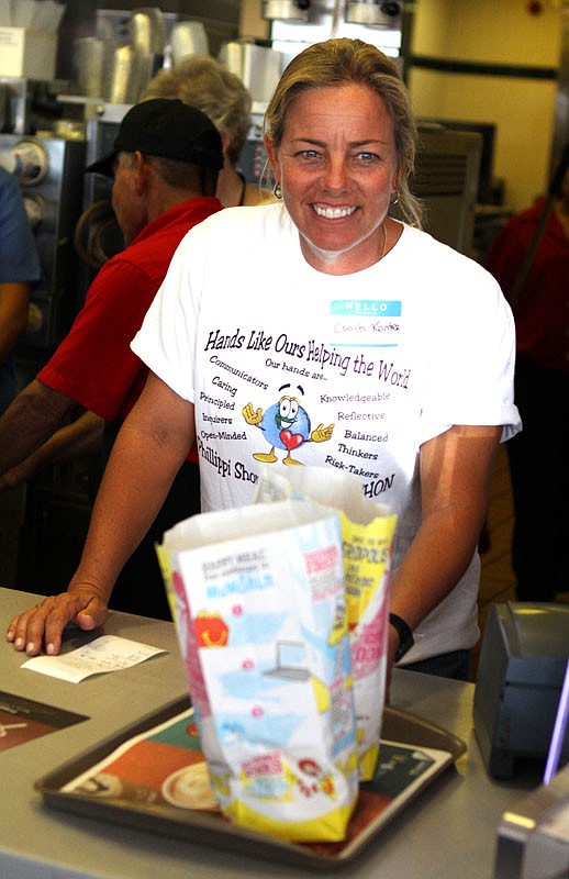 Coach Kanter working behind the counter.