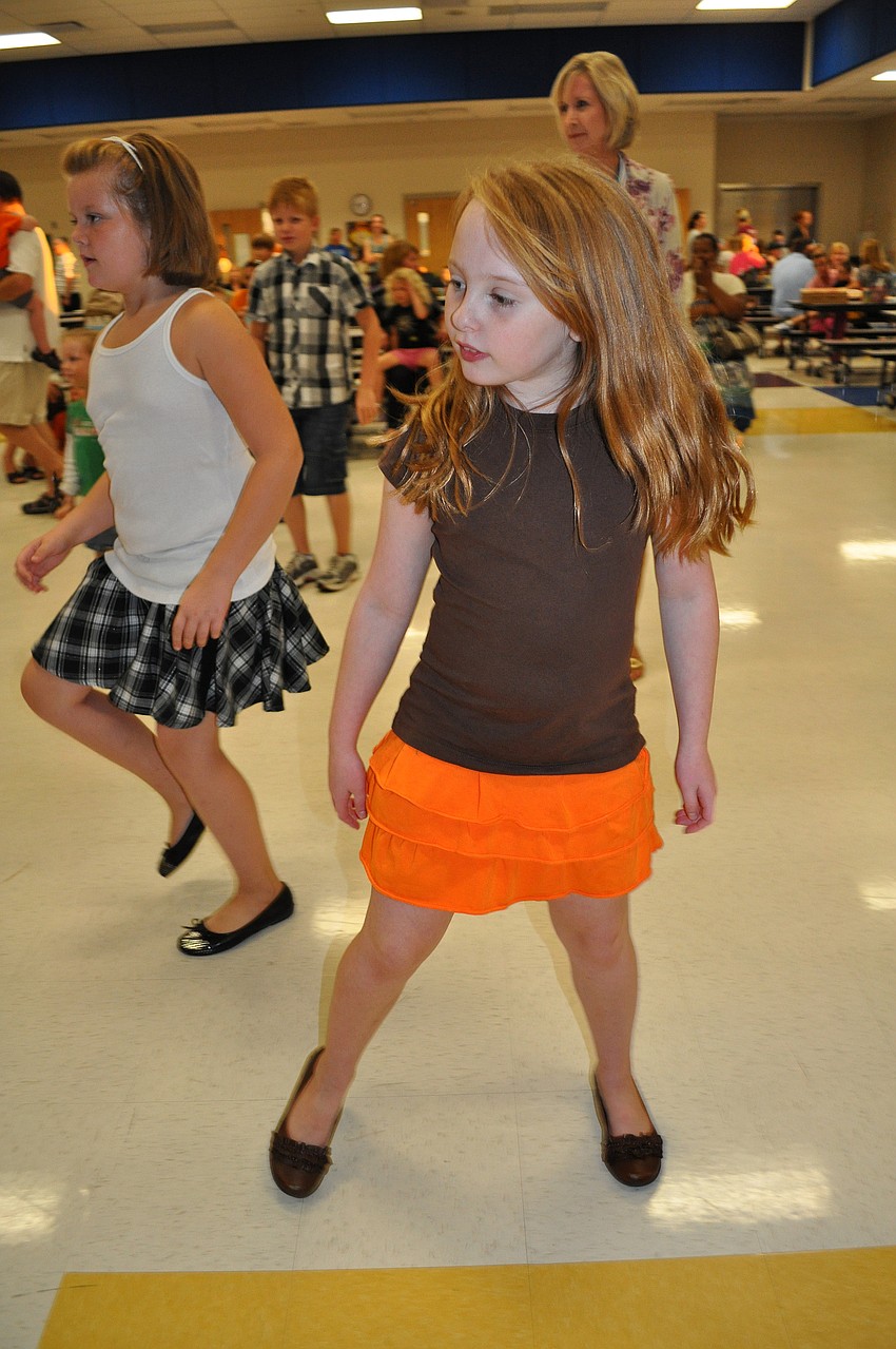 Hailey Wahlers, 8, quickly learned a line dance.