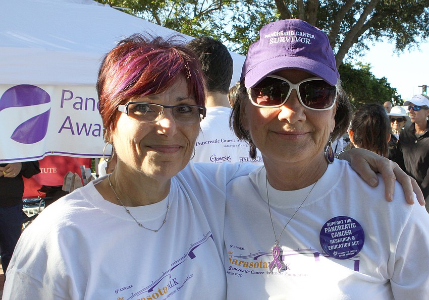 Pancreatic cancer survivors Suzanne Bourdeau and Joan Gardyasz pose together prior to starting the Sarasota Walk.