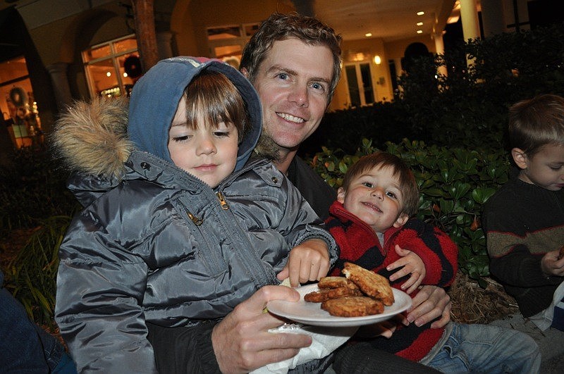 Rocco Rell, left, enjoyed potato latkas with his dad, Brian, and brother, River.