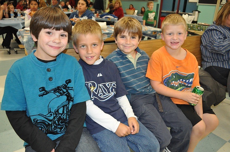 Justin Shofter, Gavin Claussen, Tyson Peco and Matt Manning enjoyed being with friends and eating food.