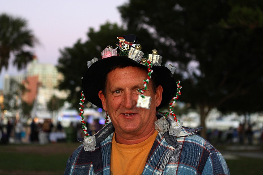 John Ready wears his homemade light up hat to the boat parade.