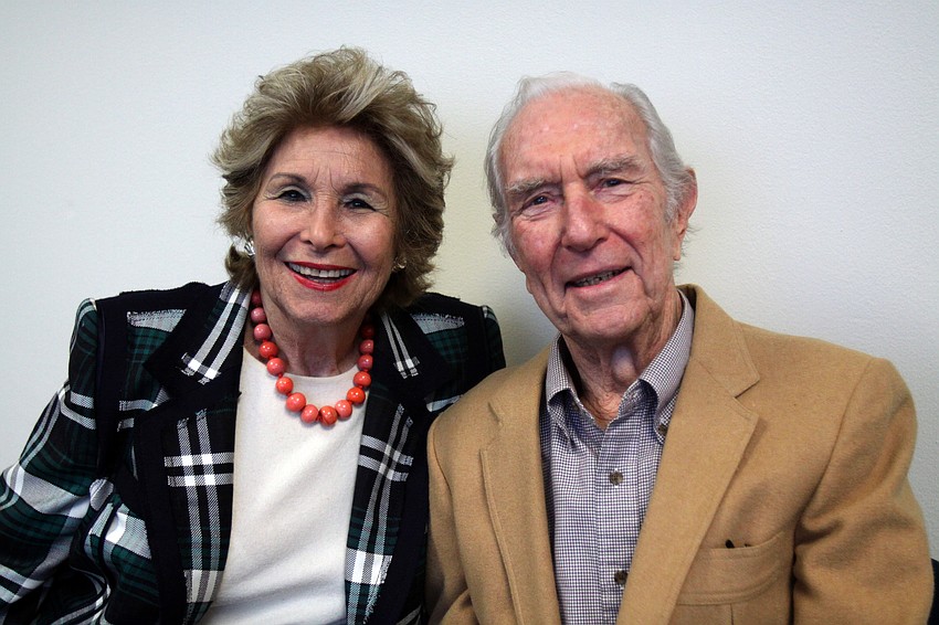Carol and Mort Siegler sit next to one another prior to the small ceremony that took place Thursday night during AJCâ€™s Grand Opening Cocktail Party. Sieglers donated the mezuzah that was put up at the front door of the new office during the party.