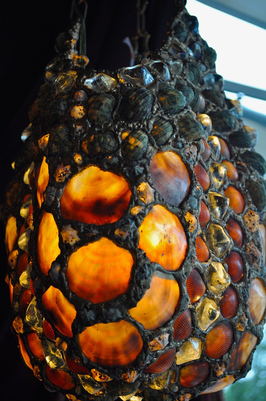 Diana and Scott Drake make lamps using rare, natural exotic shells.