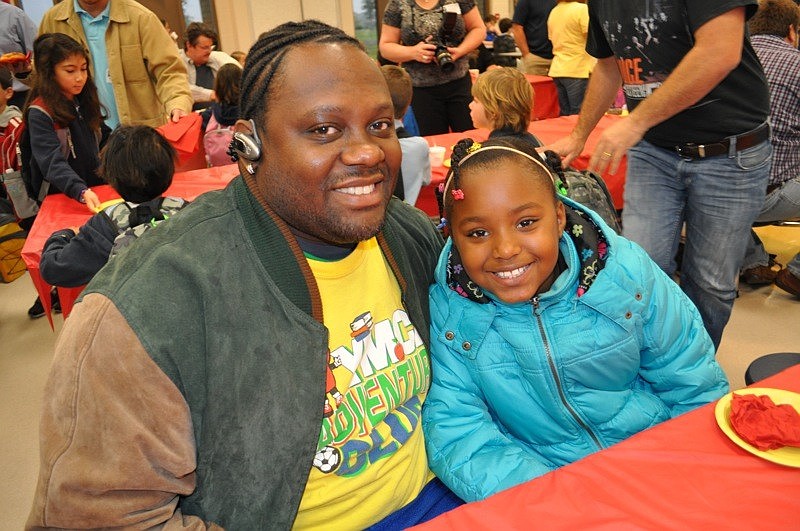 Izzy Laguerre and his daughter Ausiana, 7, ate the same type of doughnut.