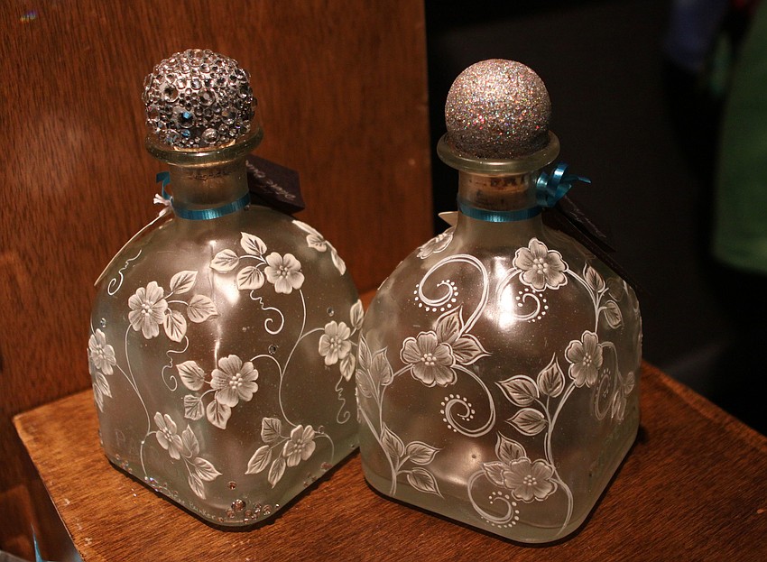 Two of Diane Bunker's tequila bottles that she decorated were up for sale on Thursday, Feb. 10 at the Fabulous Arts Boutique.