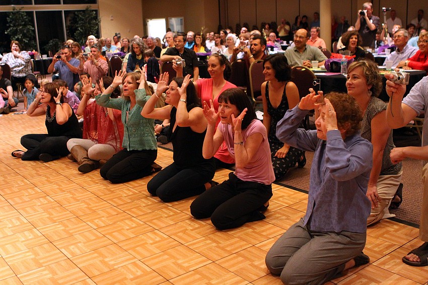 The Dvorim and Parparim teachers Barbara Levitt, Chelsea Dennis, Illene Dyrda, Bethany Leinweber, Karen Veon, and Cheryl Brilliant help the pre-schoolers sing Rum Sum Sum on Feb. 26 at Temple Sinai's 2nd Annual 