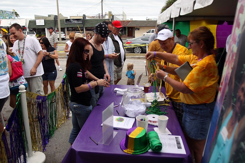 People show up to enjoy the 1st Annual Sarasota Mardi Gras that was held at Voocaray in Gulf Gate.