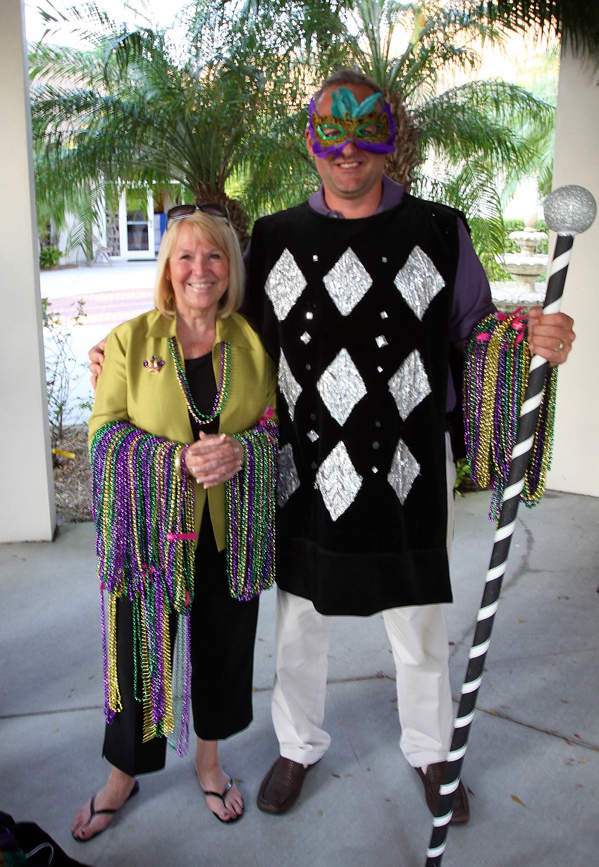 Diana Corrigan, Executive Director of the St. Armands Circle Associaton, with Kurt Hennard, of Marine Max, pose together on Tuesday, Mar. 8 during Masquerade â€” Mardi Gras St. Armands Style.