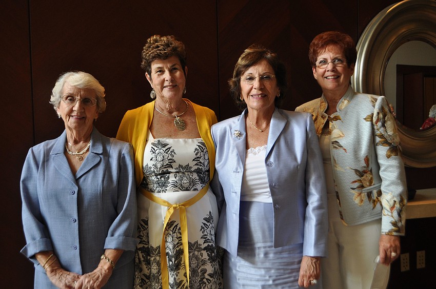 St. Michael's Women's Guild past presidents Mary Lunkes and Carol Bauer, event chairwoman, Eleanor Villardi, and women's guild president, Kathy Roche.