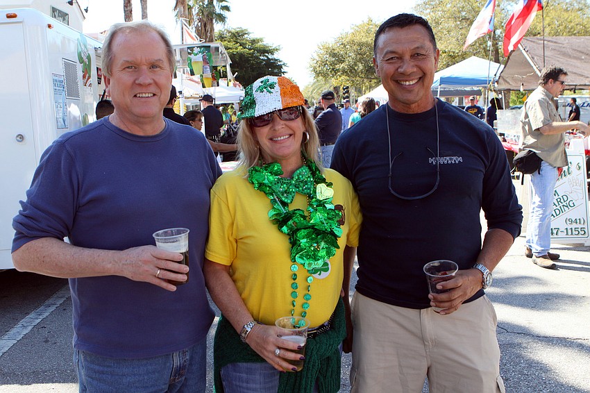 Marc Pease, Grace Williams-Hemore and Rudy Martinez enjoy some beer and black and tans on Saturday, March 12 at the Sham Rock Festival on Hillview.