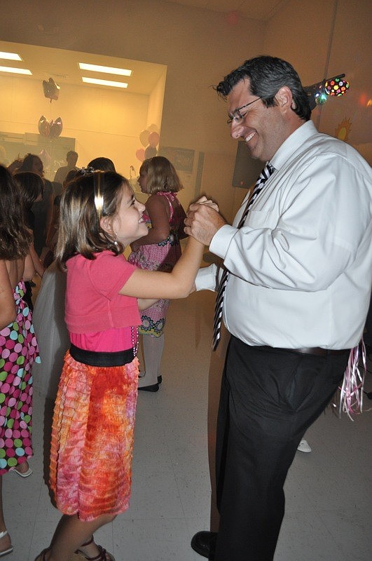 Rachel Williams, 8, enjoyed dancing with her dad, Lance.