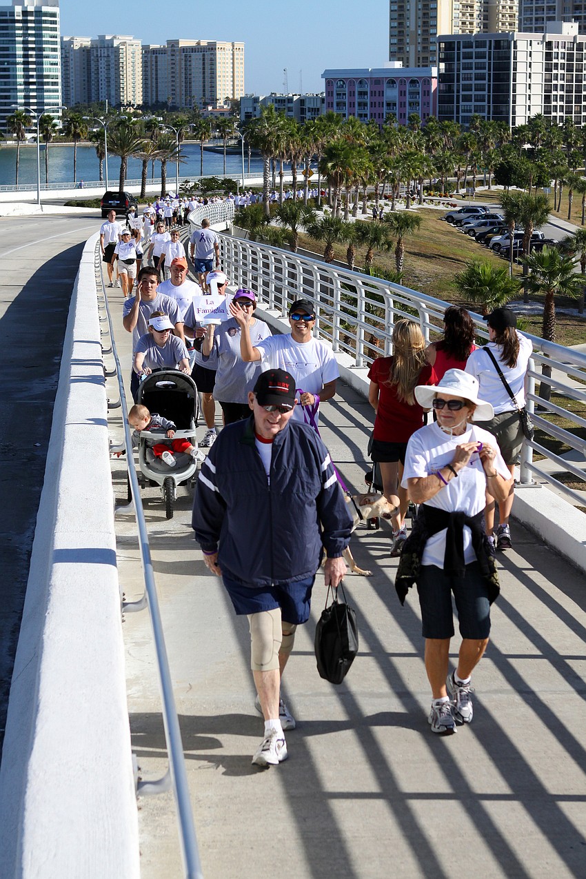 Participants in the Sarasota Walk make their way across the John Ringling Bridge.