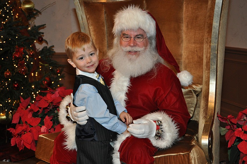Nathan Pletosu with Santa