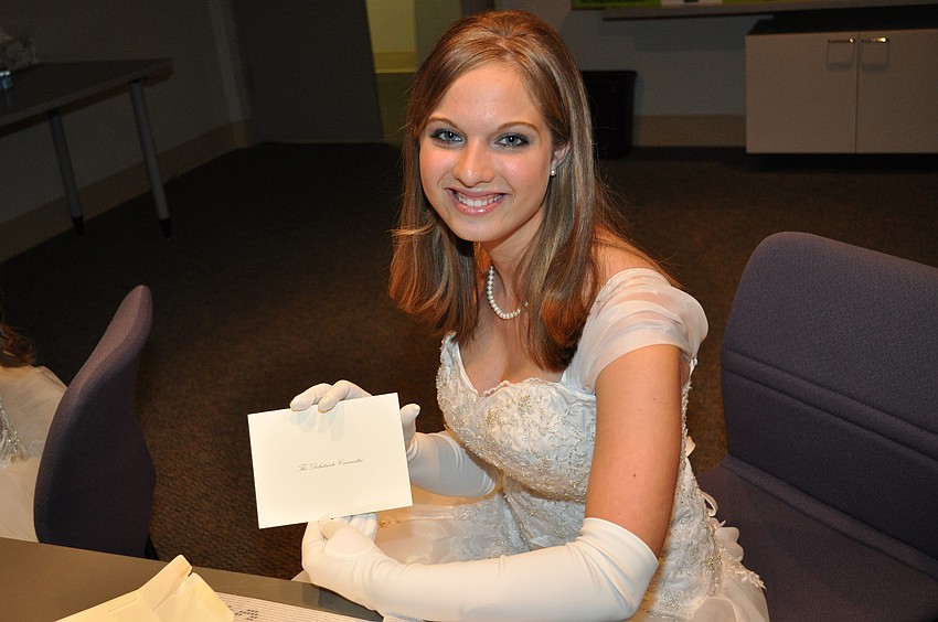 Ashleigh Gregoria reads her letter from her parents